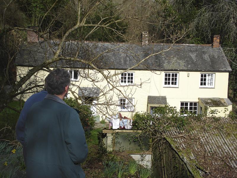 Chris and Derek look toward the house