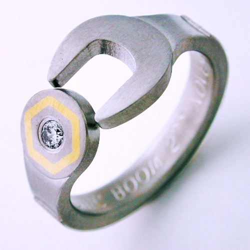 Enfield titanium ring with wrenches Titanium Wedding Rings