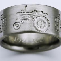 Ring shown is 11mm, size 10.5. Titanium Wedding Ring by Exotica Jewelry